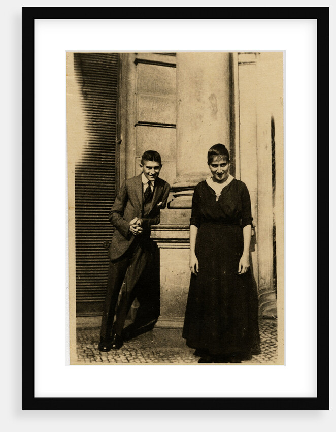 Franz Kafka with his sister Ottla before Oppelt House in Prague by Anonymous