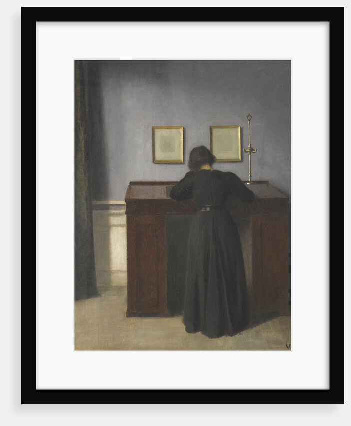 Ida Standing at a Desk by Vilhelm Hammershøi