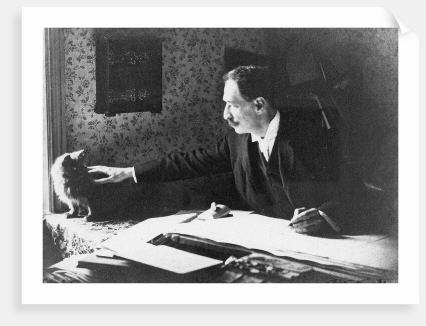 Louis Wain at his drawing board, 1890s by Anonymous