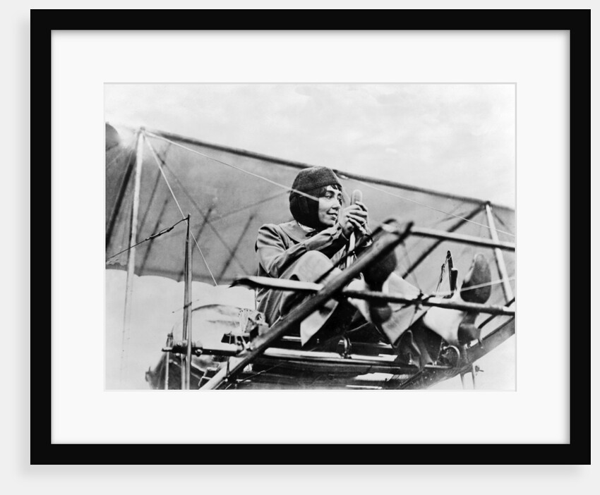 Hélène Dutrieu at the controls of her plane, c.1911 by Anonymous