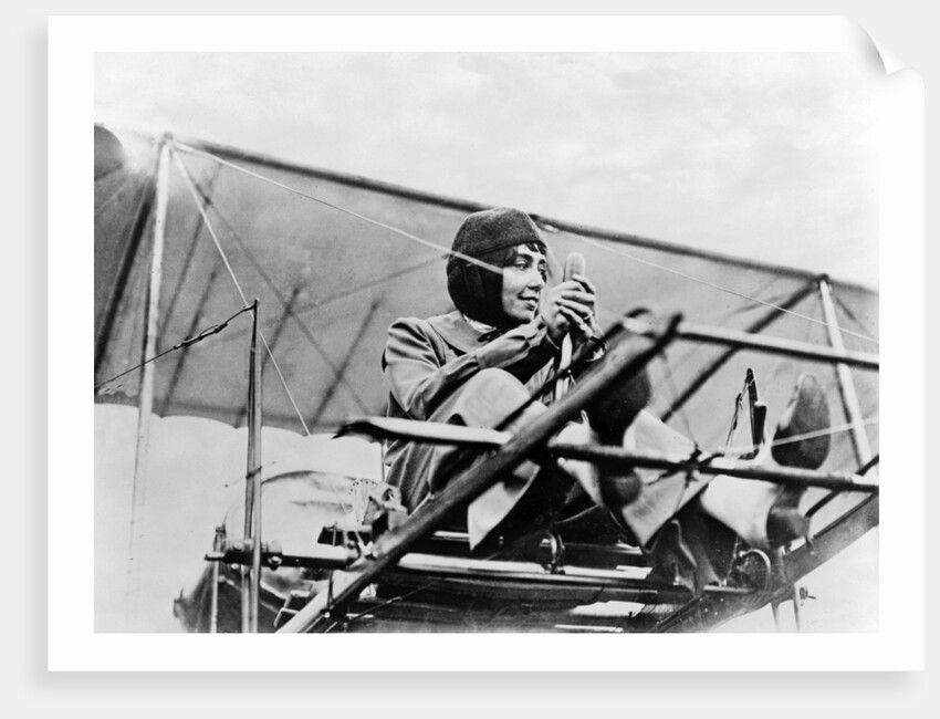 Hélène Dutrieu at the controls of her plane, c.1911 by Anonymous