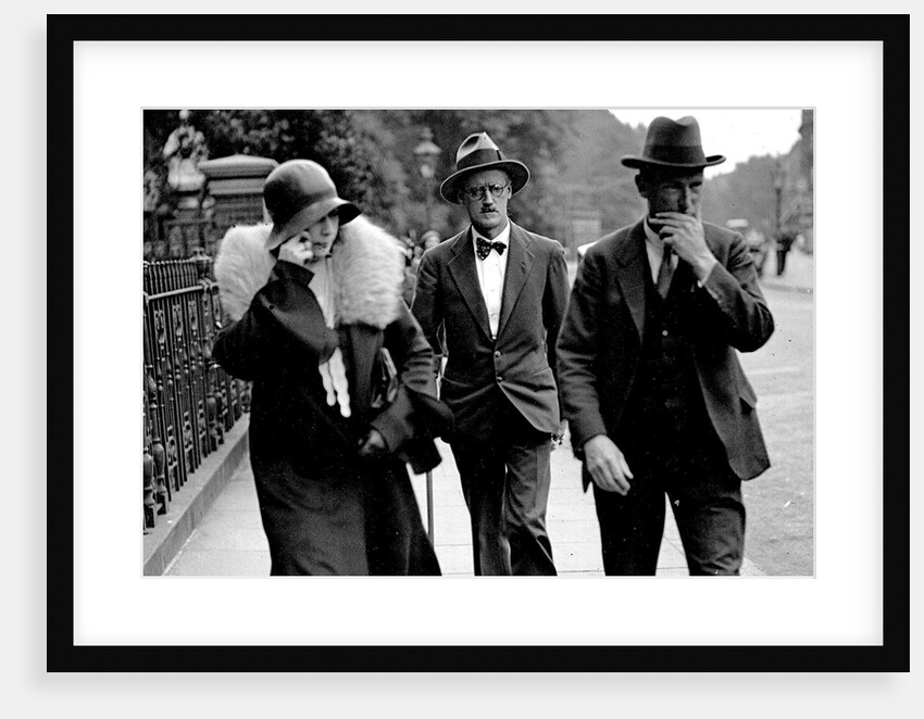 Nora Barnacle (left), James Joyce (center) and their solicitor n London on the day of their marriage by Anonymous
