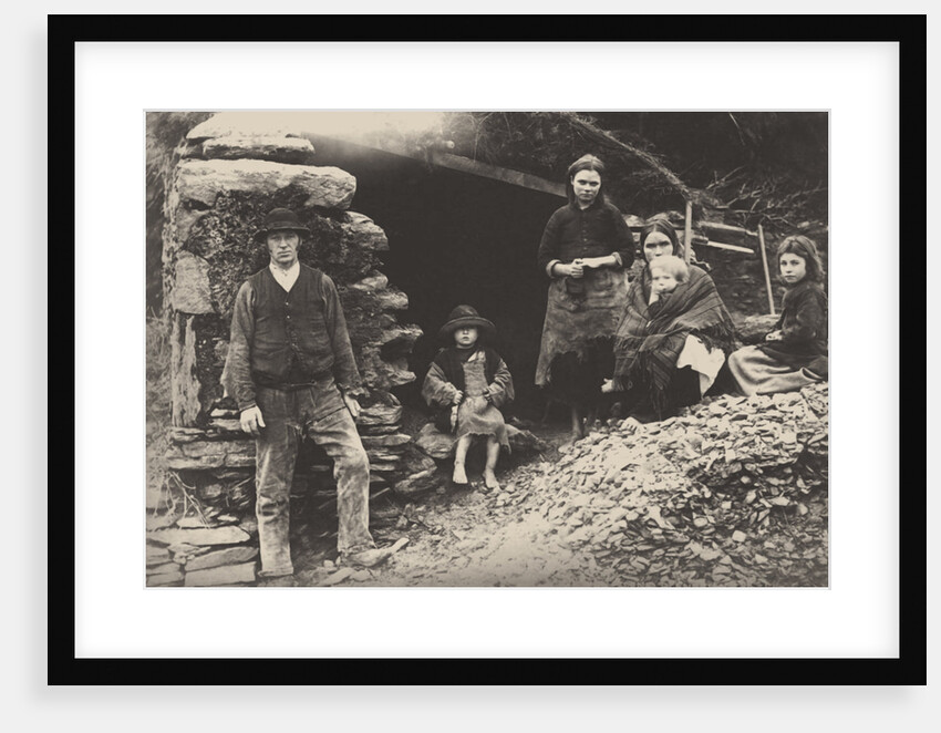 The Great Famine. A family at the ruins of their house in Killarney, 1888 by Anonymous