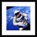 US Astronaut Edward H. White II carrying out external tasks by Unknown