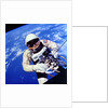 US Astronaut Edward H. White II carrying out external tasks by Unknown