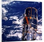 Hubble Space Telescope above the Earth by Unknown