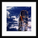 Hubble Space Telescope above the Earth by Unknown