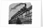 Train crossing a wooden trestle bridge on the Union Pacific Railroad, Wyoming, USA, c1870 by Unknown
