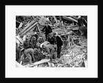 Rescue workers releasing a man from a bomb damaged building, World War II, 1940 by Unknown