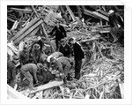 Rescue workers releasing a man from a bomb damaged building, World War II, 1940 by Unknown