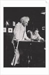 Mark Twain, American author, playing pool by Unknown
