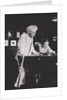 Mark Twain, American author, playing pool by Unknown