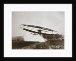 American aviator Glenn Curtiss making the first heavier-than-air flight in his June Bug, 1908 by Edwin Levick