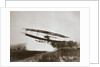 American aviator Glenn Curtiss making the first heavier-than-air flight in his June Bug, 1908 by Edwin Levick