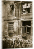 A crowd of men gathered in front of a ruined building, Germany by Unknown