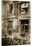 A crowd of men gathered in front of a ruined building, Germany by Unknown