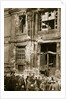 A crowd of men gathered in front of a ruined building, Germany by Unknown