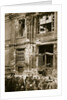A crowd of men gathered in front of a ruined building, Germany by Unknown