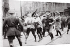 Men in Bolshevik uniform fighting police in the street, Germany by Unknown