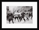 Men in Bolshevik uniform fighting police in the street, Germany by Unknown