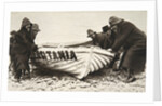 Hauling one of the Lusitania's lifeboats onto the beach, Ireland, 8 May 1915 by Clarke & Hyde