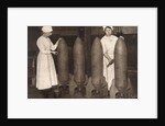 Women munitions workers putting a coat of paint on aerial bombs, World War I, c1914-c1918 by S and G