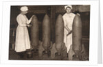 Women munitions workers putting a coat of paint on aerial bombs, World War I, c1914-c1918 by S and G