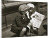 Two boys reading the comic section of the Sunday paper, New York, USA, 1931 by Unknown
