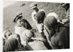 A Kolkhoz brigade taking a break, USSR, 1931 by Anonymous