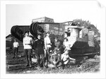 Soldiers of the Volunteer Army before the tank General Drozdovsky, 1919. by Anonymous