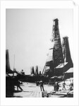 Oil extraction in Baku, Russia, c1903-c1906. by Anonymous