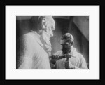 Russian sculptor Sergey Merkurov working on his statue of Leo Tolstoy by Anonymous