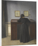 Ida Standing at a Desk by Vilhelm Hammershøi