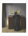 Ida Standing at a Desk by Vilhelm Hammershøi