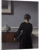 Interior with Young Woman from Behind by Vilhelm Hammershøi