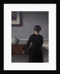 Interior with Young Woman from Behind by Vilhelm Hammershøi