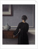 Interior with Young Woman from Behind by Vilhelm Hammershøi