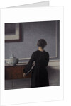 Interior with Young Woman from Behind by Vilhelm Hammershøi