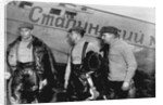 Alexander Belyakov, Georgiy Baidukov and Valery Chkalov by their plane on June 20, 1937 by Anonymous