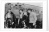 Alexander Belyakov, Georgiy Baidukov and Valery Chkalov by their plane on June 20, 1937 by Anonymous
