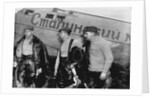 Alexander Belyakov, Georgiy Baidukov and Valery Chkalov by their plane on June 20, 1937 by Anonymous