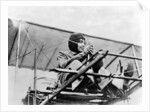 Hélène Dutrieu at the controls of her plane, c.1911 by Anonymous