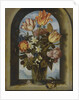tulips, moss-roses, lily-of-the-valley and other flowers in a glass beaker set in an arched stone wi by Anonymous