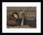 Girl reading on a sofa, c. 1920 by Anonymous