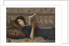 Girl reading on a sofa, c. 1920 by Anonymous
