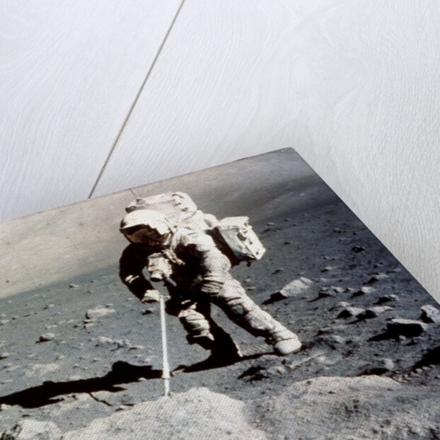 Harrison Schmitt works the scoop on the lunar surface, Apollo 17 mission, December 1972 by NASA