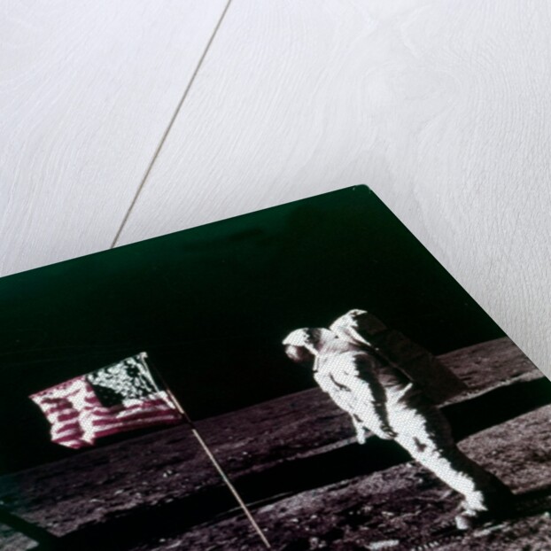 Buzz Aldrin stands next to the American flag on the surface of the Moon, July 1969 by Neil Armstrong