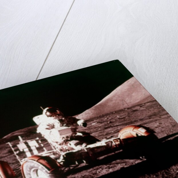Eugene Cernan using the Rover on the lunar surface, Apollo 17 mission, December 1972 by NASA
