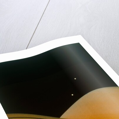 The planet Saturn with moons Tethys and Dione by NASA