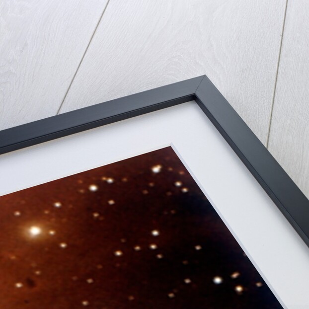 Nebulosity and star cluster in Serpens by NASA